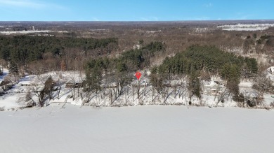 Welcome to this picturesque lakeside retreat, nestled on the on Spruce Ridge Golf Club in Michigan - for sale on GolfHomes.com, golf home, golf lot