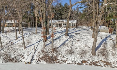 Welcome to this picturesque lakeside retreat, nestled on the on Spruce Ridge Golf Club in Michigan - for sale on GolfHomes.com, golf home, golf lot