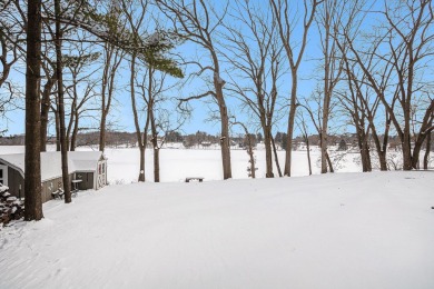 Welcome to this picturesque lakeside retreat, nestled on the on Spruce Ridge Golf Club in Michigan - for sale on GolfHomes.com, golf home, golf lot