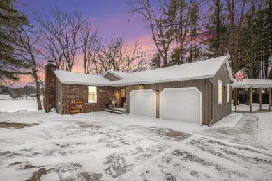 Welcome to this picturesque lakeside retreat, nestled on the on Spruce Ridge Golf Club in Michigan - for sale on GolfHomes.com, golf home, golf lot