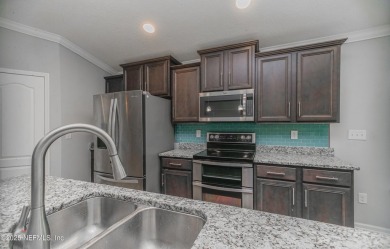 A Beautiful Chapter Begins in Samara Lakes - Upgraded Longwood on King and Bear Golf Course/World Golf Village in Florida - for sale on GolfHomes.com, golf home, golf lot