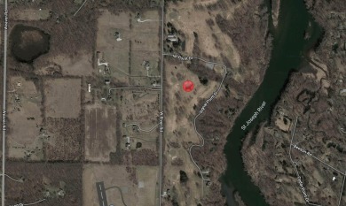 This property is approximately 36 acres and is just north of on Signal Point Club in Michigan - for sale on GolfHomes.com, golf home, golf lot