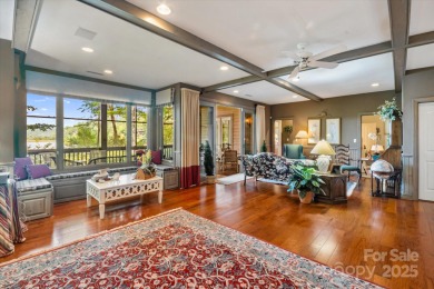 Situated on beautiful Lake Ticoa in the gated community of on Connestee Falls Golf Club in North Carolina - for sale on GolfHomes.com, golf home, golf lot