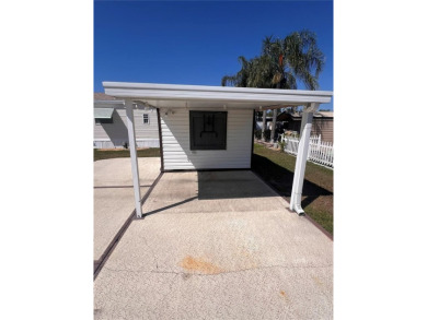 Thinking about moving to Florida for the Winters? 
Well then on Lily Lake Golf and RV Resort in Florida - for sale on GolfHomes.com, golf home, golf lot