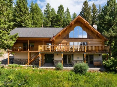 This charming log home, nestled in the trees and perched above on Big Sky of Montana Golf Course in Montana - for sale on GolfHomes.com, golf home, golf lot