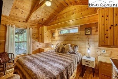 One bedroom, one bath Green River Log Cabin located in the on Land Harbor Golf Course in North Carolina - for sale on GolfHomes.com, golf home, golf lot