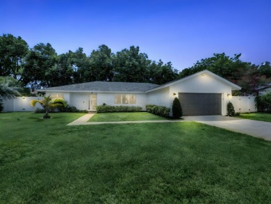 Tucked away on a quiet cul-de-sac and backing onto the lush on  in Florida - for sale on GolfHomes.com, golf home, golf lot