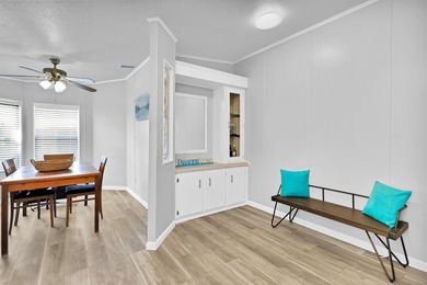 Discover this beautifully updated split-bedroom home featuring on Barefoot Bay Golf Course in Florida - for sale on GolfHomes.com, golf home, golf lot