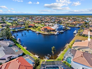 Punta Gorda Isles! Incredible water views from this 3 bedroom on Saint Andrews South Golf Club in Florida - for sale on GolfHomes.com, golf home, golf lot