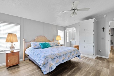 Discover this beautifully updated split-bedroom home featuring on Barefoot Bay Golf Course in Florida - for sale on GolfHomes.com, golf home, golf lot