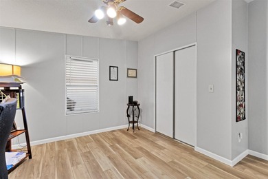 Discover this beautifully updated split-bedroom home featuring on Barefoot Bay Golf Course in Florida - for sale on GolfHomes.com, golf home, golf lot