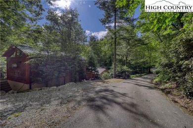 One bedroom, one bath Green River Log Cabin located in the on Land Harbor Golf Course in North Carolina - for sale on GolfHomes.com, golf home, golf lot