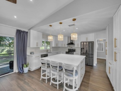 Tucked away on a quiet cul-de-sac and backing onto the lush on  in Florida - for sale on GolfHomes.com, golf home, golf lot