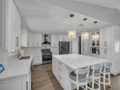 Tucked away on a quiet cul-de-sac and backing onto the lush on  in Florida - for sale on GolfHomes.com, golf home, golf lot