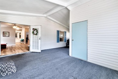 Discover this beautifully updated split-bedroom home featuring on Barefoot Bay Golf Course in Florida - for sale on GolfHomes.com, golf home, golf lot