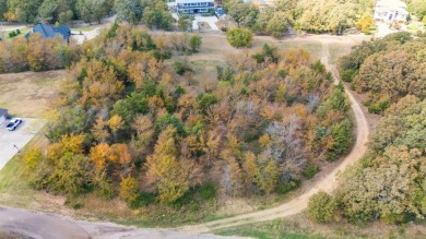 In Country Club Estates, one wooded acre! on Sulphur Springs Country Club in Texas - for sale on GolfHomes.com, golf home, golf lot