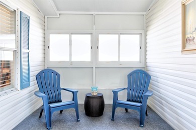 Discover this beautifully updated split-bedroom home featuring on Barefoot Bay Golf Course in Florida - for sale on GolfHomes.com, golf home, golf lot