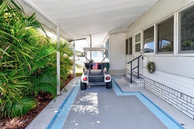 Discover this beautifully updated split-bedroom home featuring on Barefoot Bay Golf Course in Florida - for sale on GolfHomes.com, golf home, golf lot