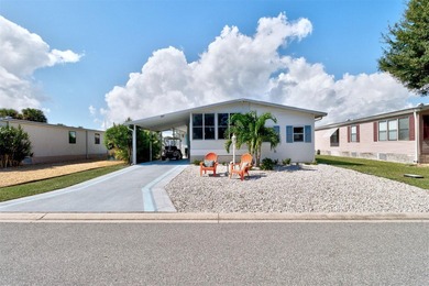 Discover this beautifully updated split-bedroom home featuring on Barefoot Bay Golf Course in Florida - for sale on GolfHomes.com, golf home, golf lot