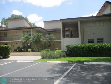 Spacious 2-Bedroom, 2-Bath Unit with Serene Golf Course Views! on Woodmont Country Club in Florida - for sale on GolfHomes.com, golf home, golf lot