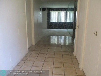 Spacious 2-Bedroom, 2-Bath Unit with Serene Golf Course Views! on Woodmont Country Club in Florida - for sale on GolfHomes.com, golf home, golf lot