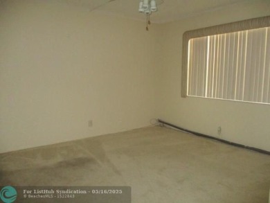 Spacious 2-Bedroom, 2-Bath Unit with Serene Golf Course Views! on Woodmont Country Club in Florida - for sale on GolfHomes.com, golf home, golf lot