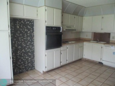 Spacious 2-Bedroom, 2-Bath Unit with Serene Golf Course Views! on Woodmont Country Club in Florida - for sale on GolfHomes.com, golf home, golf lot