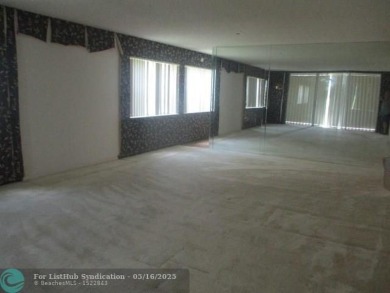 Spacious 2-Bedroom, 2-Bath Unit with Serene Golf Course Views! on Woodmont Country Club in Florida - for sale on GolfHomes.com, golf home, golf lot