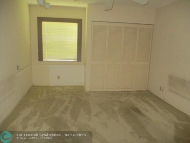 Spacious 2-Bedroom, 2-Bath Unit with Serene Golf Course Views! on Woodmont Country Club in Florida - for sale on GolfHomes.com, golf home, golf lot