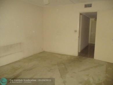 Spacious 2-Bedroom, 2-Bath Unit with Serene Golf Course Views! on Woodmont Country Club in Florida - for sale on GolfHomes.com, golf home, golf lot