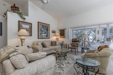 Rarely available end-unit condo with attached garage offering on Imperial Golf Club in Florida - for sale on GolfHomes.com, golf home, golf lot