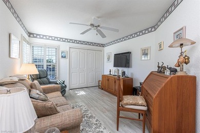 Rarely available end-unit condo with attached garage offering on Imperial Golf Club in Florida - for sale on GolfHomes.com, golf home, golf lot