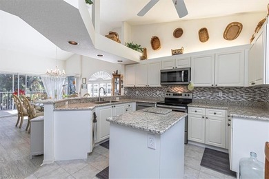 Rarely available end-unit condo with attached garage offering on Imperial Golf Club in Florida - for sale on GolfHomes.com, golf home, golf lot