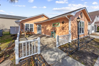 This inviting single-level three-bedroom, two-bath beach home is on Whispering Pines in South Carolina - for sale on GolfHomes.com, golf home, golf lot