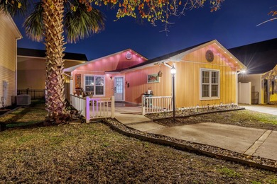 This inviting single-level three-bedroom, two-bath beach home is on Whispering Pines in South Carolina - for sale on GolfHomes.com, golf home, golf lot
