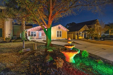 This inviting single-level three-bedroom, two-bath beach home is on Whispering Pines in South Carolina - for sale on GolfHomes.com, golf home, golf lot
