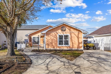 This inviting single-level three-bedroom, two-bath beach home is on Whispering Pines in South Carolina - for sale on GolfHomes.com, golf home, golf lot
