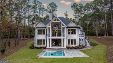 This meticulous custom golf residence is impeccably built with on Reynolds Lake Oconee - The Oconee in Georgia - for sale on GolfHomes.com, golf home, golf lot