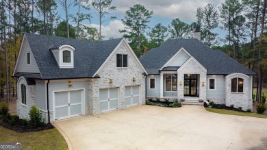 This meticulous custom golf residence is impeccably built with on Reynolds Lake Oconee - The Oconee in Georgia - for sale on GolfHomes.com, golf home, golf lot