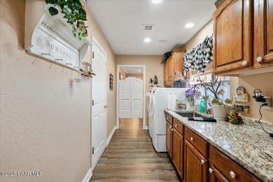 Charm, warmth, and timeless elegance come together in this on  in Arizona - for sale on GolfHomes.com, golf home, golf lot