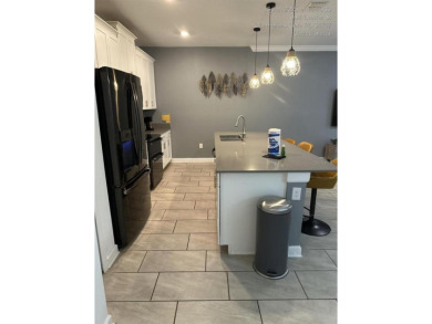 Welcome to this beautifully furnished 4-bedroom, 3-bath on National Golf Course in Florida - for sale on GolfHomes.com, golf home, golf lot