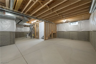 Welcome to your dream home at 836 Buckingham Drive, Lagrange in on Grey Hawk Golf Club in Ohio - for sale on GolfHomes.com, golf home, golf lot