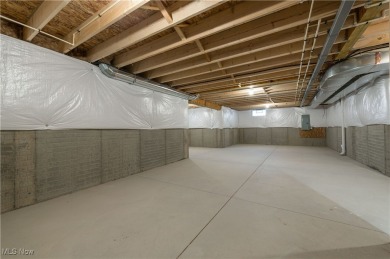 Welcome to your dream home at 836 Buckingham Drive, Lagrange in on Grey Hawk Golf Club in Ohio - for sale on GolfHomes.com, golf home, golf lot
