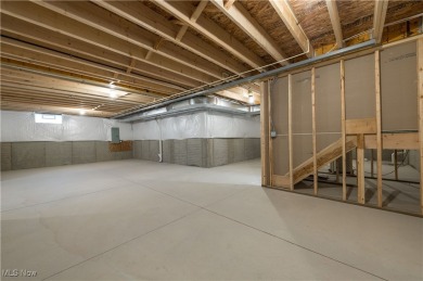 Welcome to your dream home at 836 Buckingham Drive, Lagrange in on Grey Hawk Golf Club in Ohio - for sale on GolfHomes.com, golf home, golf lot
