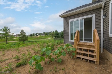 Welcome to your dream home at 836 Buckingham Drive, Lagrange in on Grey Hawk Golf Club in Ohio - for sale on GolfHomes.com, golf home, golf lot