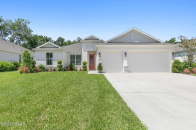 4 bedroom/ 3 bathroom pool home with a 3 car garage in Halifax on Halifax Plantation Golf Club in Florida - for sale on GolfHomes.com, golf home, golf lot