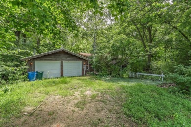 Rare opportunity! This 3 bed, 2 bath fixer-upper sits on over 2 on Baraboo Country Club in Wisconsin - for sale on GolfHomes.com, golf home, golf lot