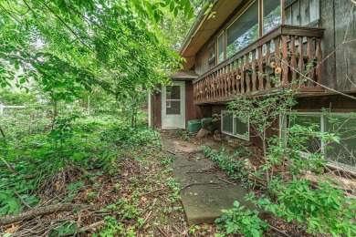 Rare opportunity! This 3 bed, 2 bath fixer-upper sits on over 2 on Baraboo Country Club in Wisconsin - for sale on GolfHomes.com, golf home, golf lot