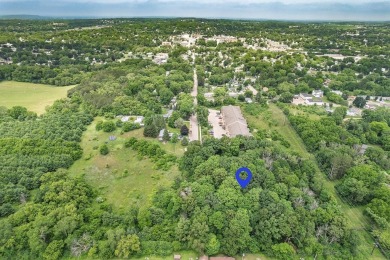 Rare opportunity! This 3 bed, 2 bath fixer-upper sits on over 2 on Baraboo Country Club in Wisconsin - for sale on GolfHomes.com, golf home, golf lot