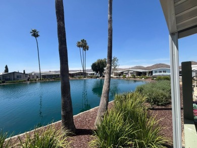 Rare lake view home now available! This home offers some of the on Hemet West Mobile Estates in California - for sale on GolfHomes.com, golf home, golf lot